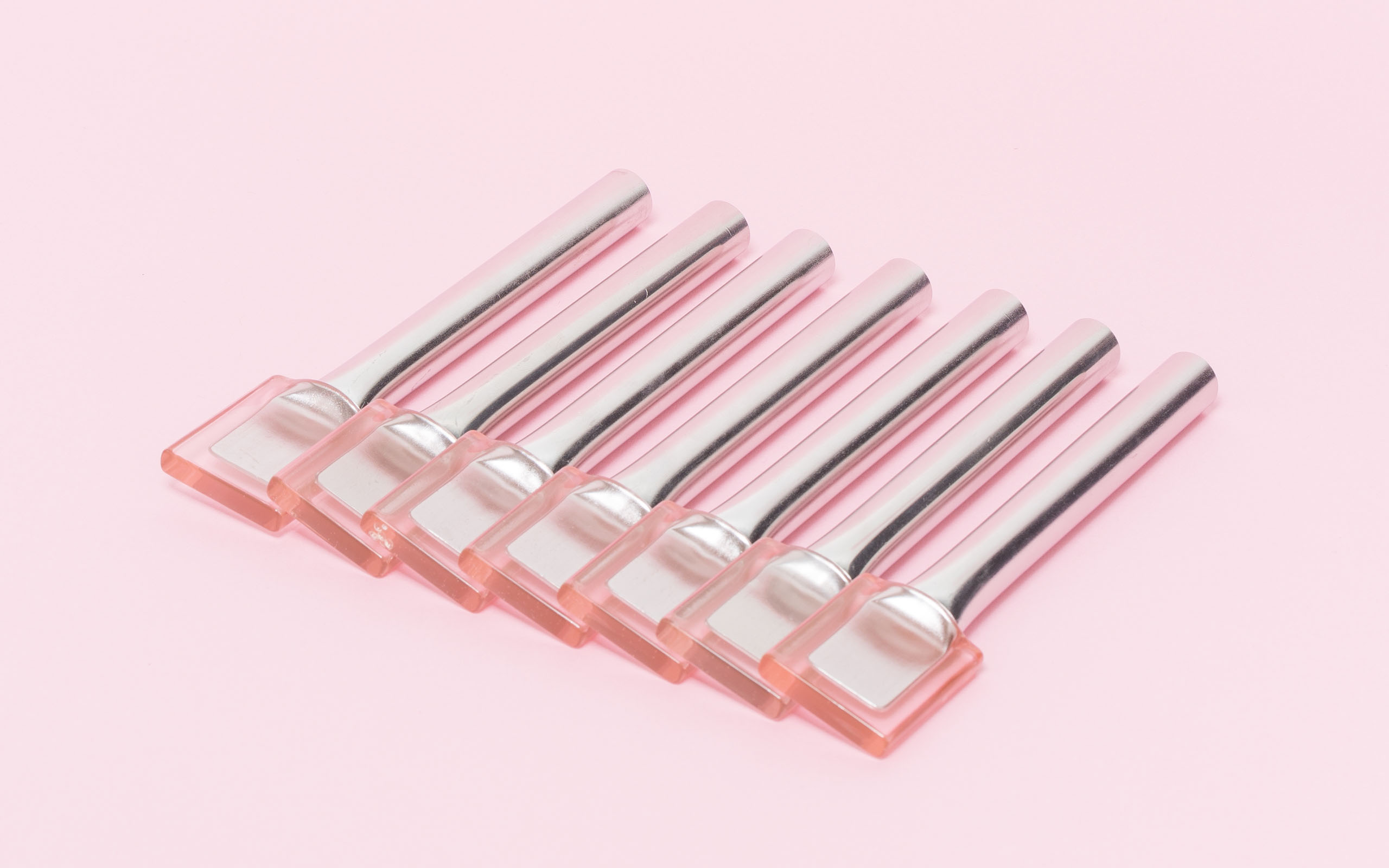 A row of Brb lollies with stainless steel grip.