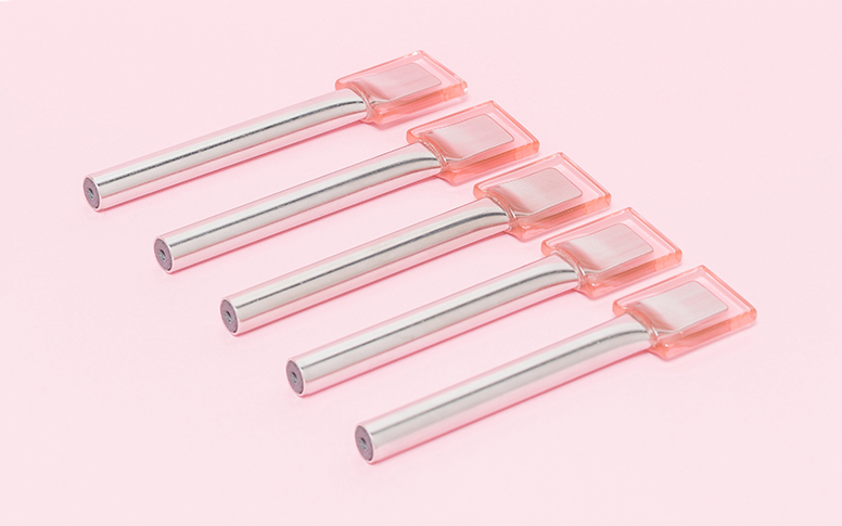 A row of Brb lollies with stainless steel grip.